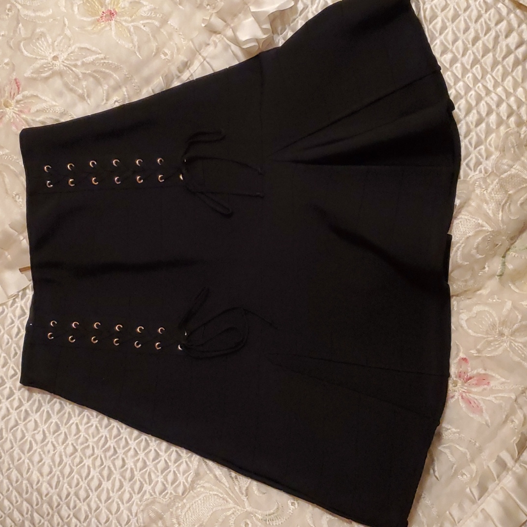 Cute Black Bebe Skirt With Tie Detailing Along The Sides